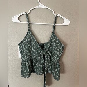 green floral spaghetti strap blouse with tie in front